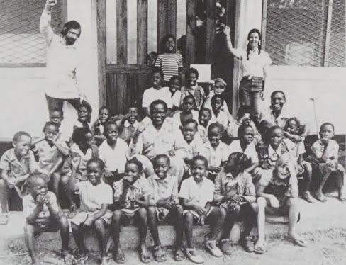 Terry Bell with children and colleagues during the exile years