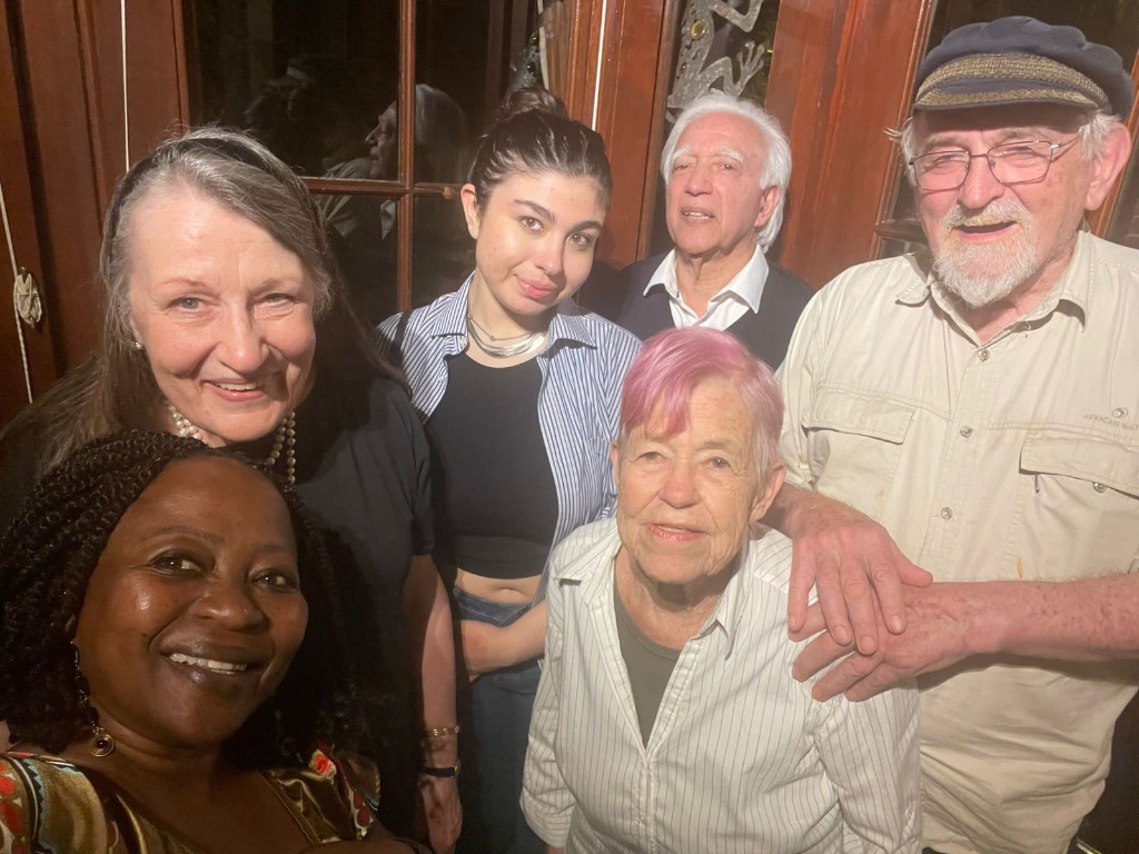 Terry Bell in a warm evening selfie with friends